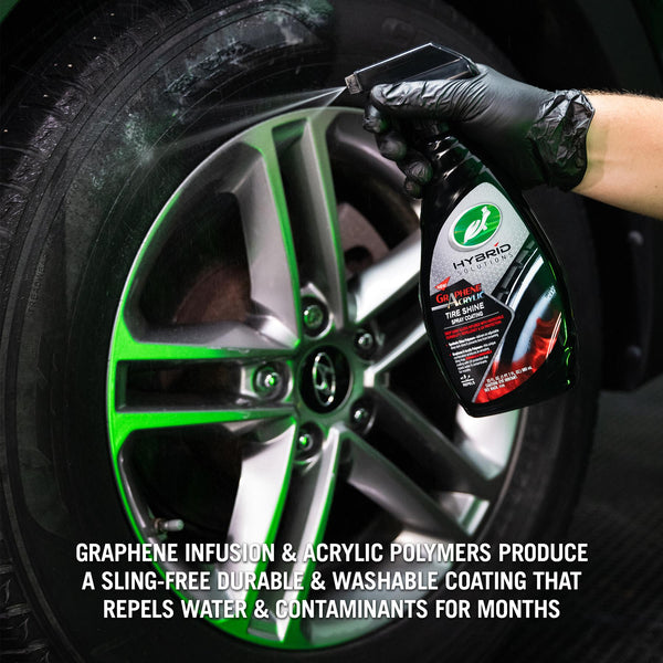 Detailing a tire with Turtle Wax Hybrid Solutions Graphene Acrylic Tire Shine. The spray promises durable, deep, dark gloss.