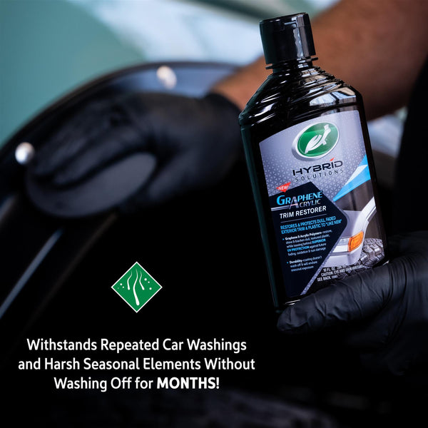 Turtle Wax Hybrid Solutions Graphene Acrylic Trim Restorer bottle. Car detailing product to restore, shine, and protect exterior trim.