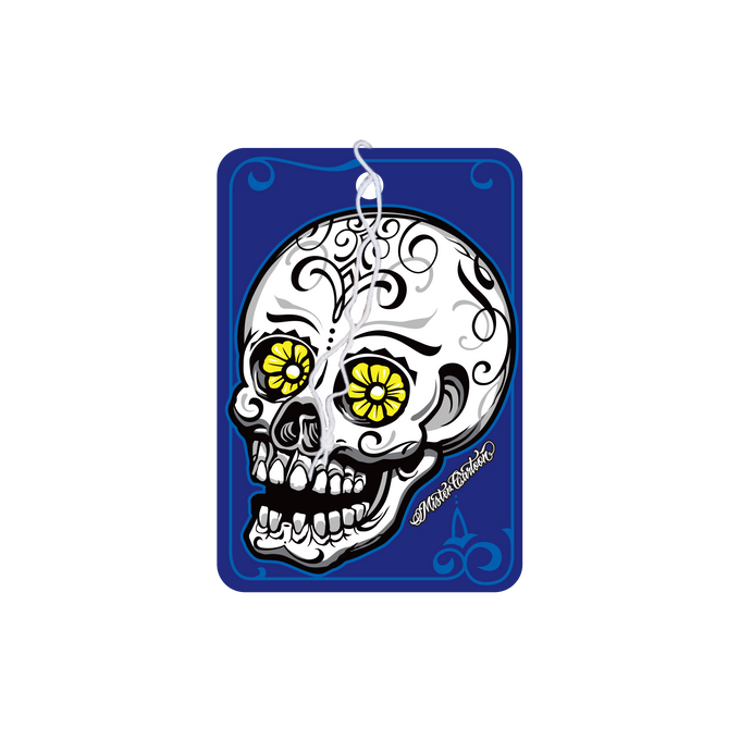 Midnight-scented air freshener. Sugar skull design with yellow flower eyes on a blue background. 